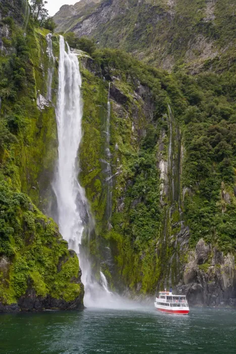 Framed Print : Tourist boat approaching Stirling Falls in Milford Sound in Fiordland National Park Framed Print : Tourist boat approaching Stirling Falls in Milford Sound in Fiordland National Park
