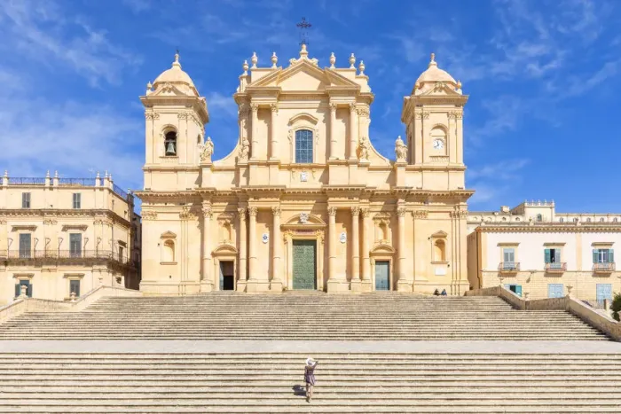 Framed Print : Tourist climbing the stairs of St nicholas church cathedral of Noto, Siracusa province Framed Print : Tourist climbing the stairs of St nicholas church cathedral of Noto, Siracusa province
