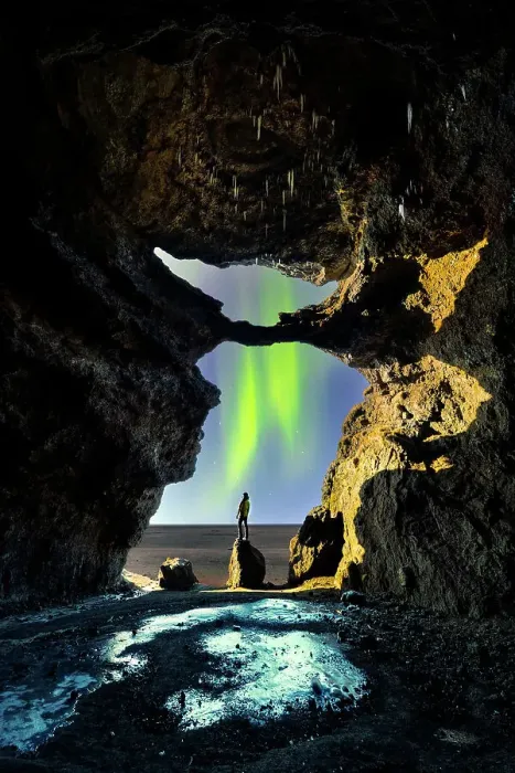 Framed Print : A tourist in Gigjagja cave during night with northern lights, Sudurland, Iceland(MR) Framed Print : A tourist in Gigjagja cave during night with northern lights, Sudurland, Iceland(MR)