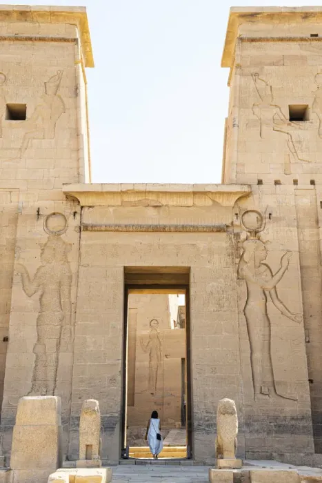 Framed Print : Tourist walking throuhg the Temple of Philae on an island in Lake Nasser, Nile River Framed Print : Tourist walking throuhg the Temple of Philae on an island in Lake Nasser, Nile River