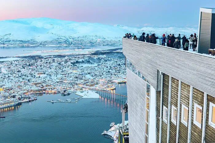Framed Print : Tourists admiring sunset over the snowy city of Tromso standing on terrace at Fjellheisen viewpoint, Norway Framed Print : Tourists admiring sunset over the snowy city of Tromso standing on terrace at Fjellheisen viewpoint, Norway