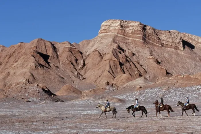 Framed Print : Tourists horse riding amongst the wind-eroded peaks Framed Print : Tourists horse riding amongst the wind-eroded peaks
