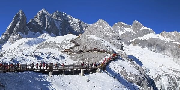 Tourists on Jade Dragon Snow Mountain (Yulong Xueshan), Lijiang, Yunnan, China