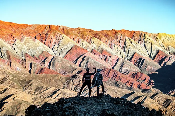 Framed Print : Tourists photographing colorful rocks, Serrania de Hornocal, Humahuaca, Jujuy, Argentina. (MR)