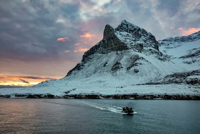 Framed Print : Tourists returning to their ship & Alkhornet mountain, Oscar II Land, Spitsbergen, Svalbard, Norway