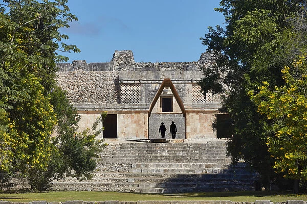 Tourists visiting the ancient Mayan town of Uxmal, Yucatan, Mexico. The ruins of Uxmal have been declared a UNESCO World Heritage Site in 1996
