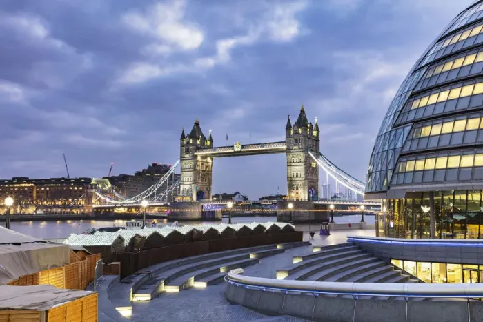 Framed Print : Tower Bridge and City Hall, right, designed by Norman Foster illuminated at Christmas