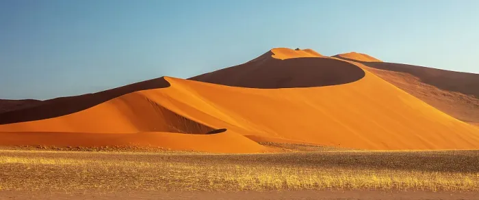 Framed Print : Towering orange sand dunes and blue sky, Sossusvlei, Namib-Naukluft National Park, Namib Desert, Namibia Framed Print : Towering orange sand dunes and blue sky, Sossusvlei, Namib-Naukluft National Park, Namib Desert, Namibia