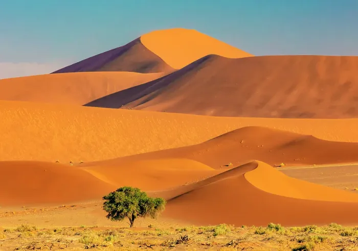 Framed Print : Towering orange sand dunes and blue sky, Sossusvlei, Namib-Naukluft National Park, Namib Desert, Namibia Framed Print : Towering orange sand dunes and blue sky, Sossusvlei, Namib-Naukluft National Park, Namib Desert, Namibia
