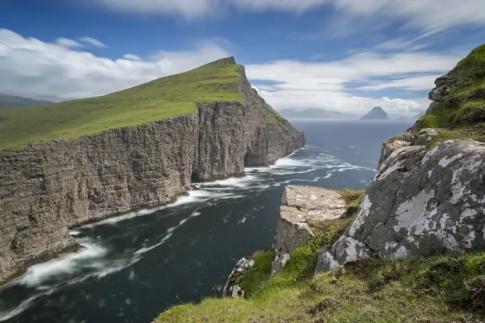 Framed Print : Towering sea cliffs on the island of Vagar in the Faroe Islands, Denmark. Summer Framed Print : Towering sea cliffs on the island of Vagar in the Faroe Islands, Denmark. Summer