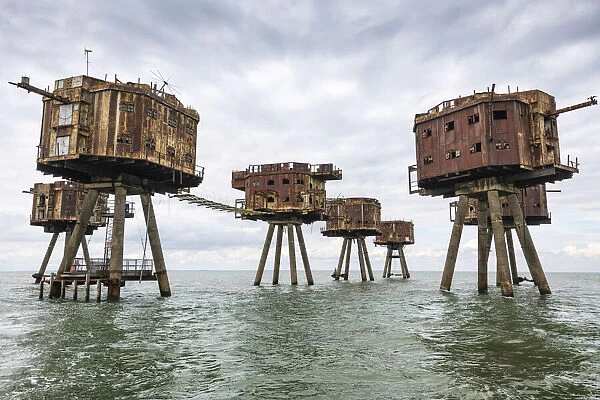 The towers of the Red Sands Fort - part of the decommissioned Maunsell Forts, the armed towers built in the Thames estuary to protect the Kent coast during the Second World War, near Whitstable, Kent, England