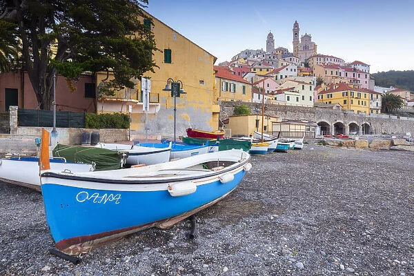 Town of Cervo and boat on its beach. Cervo, Imperia province, Ponente Riviera