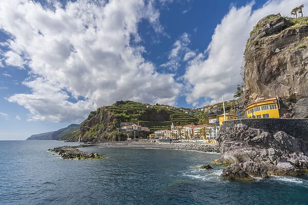 The town of Ponta do Sol with its beach and pier. Madeira Island, Portugal