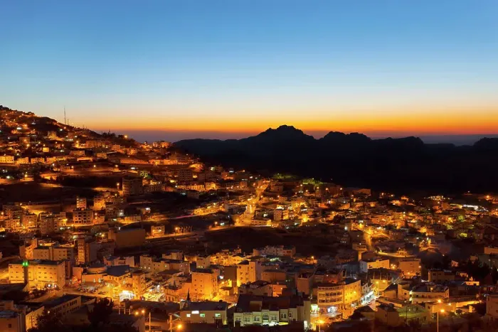 Framed Print : The town of Wadi Musa illuminated at twilight, Ma'an Governorate, Jordan, Middle East. It is the nearest town to the Nabatean archaeological site of Petra