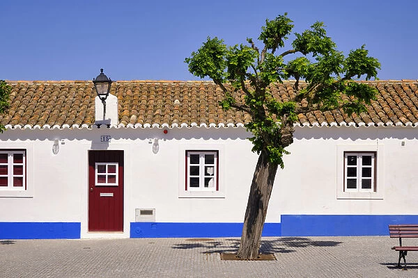 Traditional alentejan houses in the main square of Porto Covo. Sines, Portugal