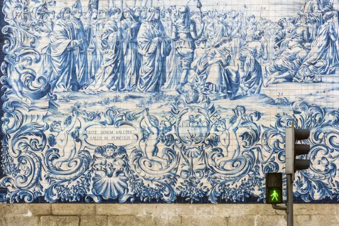 Framed Print : Traditional azulejos hand-painted tiles covering the exterior wall of the Igreja dos Framed Print : Traditional azulejos hand-painted tiles covering the exterior wall of the Igreja dos
