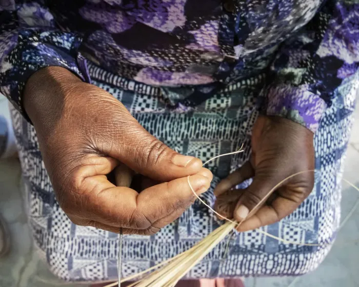 Framed Print : A traditional basket weaver in Maun, Botswana Framed Print : A traditional basket weaver in Maun, Botswana