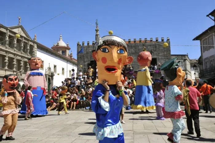 Framed Print : Traditional big-headed masks of Minho at the historical centre of Viana do Castelo