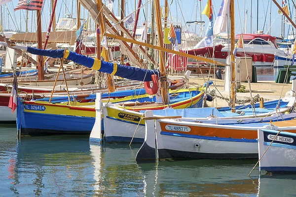 Traditional colorful wooden fishing boat in the port harbor at Sanary-sur-Mer, Var