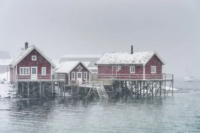 Framed Print : Traditional fishermen houses under the snow. Reine, Nordland, Northern Norway, Norway