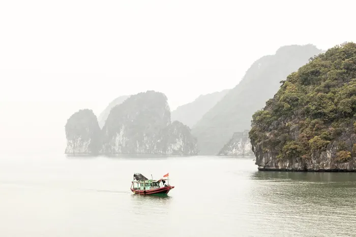 Framed Print : Traditional fishing boat and limestone islands at dawn, Halong Bay, Northeast Vietnam Framed Print : Traditional fishing boat and limestone islands at dawn, Halong Bay, Northeast Vietnam