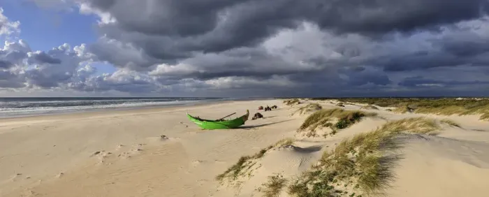 Framed Print : A traditional fishing boat on the seashore of Areao. Beira Litoral, Portugal