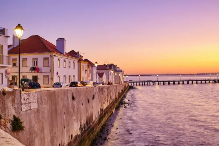 Framed Print : The traditional fishing village of Alcochete, spreading along the river Tagus Framed Print : The traditional fishing village of Alcochete, spreading along the river Tagus