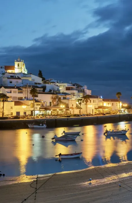 Framed Print : The traditional fishing village of Ferragudo at dusk. Algarve, Portugal Framed Print : The traditional fishing village of Ferragudo at dusk. Algarve, Portugal