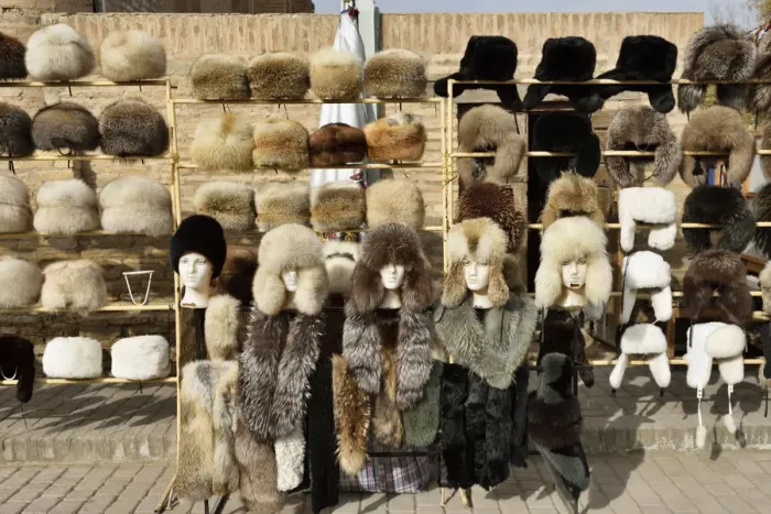 Framed Print : Traditional fur hats for sale. Itchan Kala, Khiva, Uzbekistan