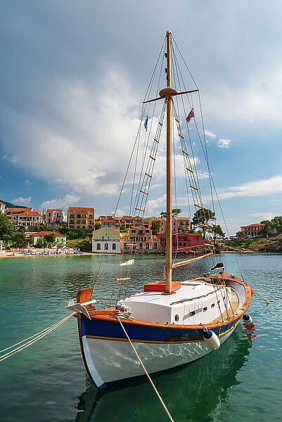 Traditional Greek sailing boat in the harbour village of Asos, Kefalonia, Ionian Islands, Greece. Summer (June) 2023