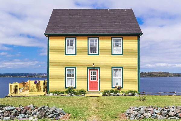 Traditional home along the rugged shores of Newfoundland, Canada