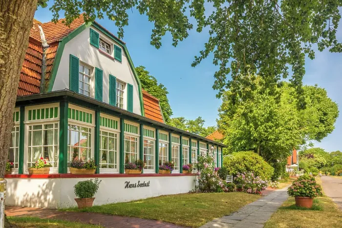 Framed Print : Traditional house in the village center of Spiekeroog, East Frisian Islands, East Frisia, Lower Saxony, Germany Framed Print : Traditional house in the village center of Spiekeroog, East Frisian Islands, East Frisia, Lower Saxony, Germany