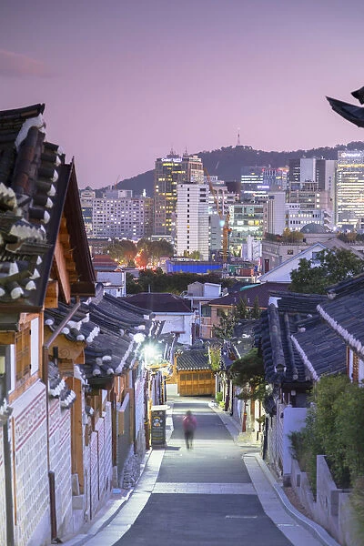 Traditional houses in Bukchon Hanok village at dusk, Seoul, South Korea