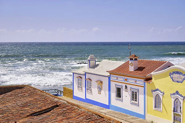 Traditional houses facing the Atlantic Ocean. Ericeira, Portugal