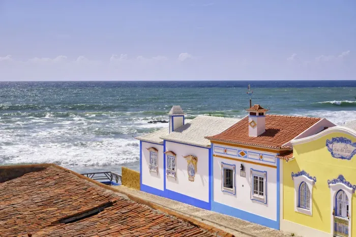 Framed Print : Traditional houses facing the Atlantic Ocean. Ericeira, Portugal Framed Print : Traditional houses facing the Atlantic Ocean. Ericeira, Portugal