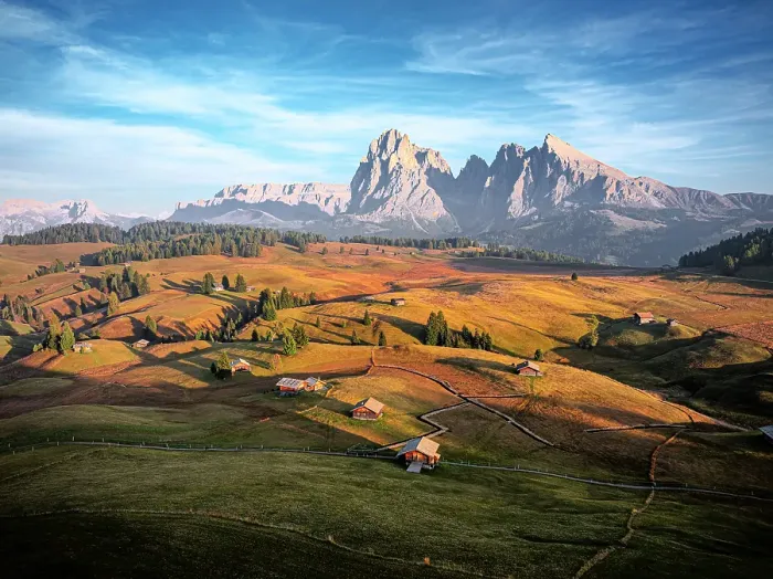Framed Print : Traditional huts with Sassolungo and Sassopiatto at sunset in autumn, Seiser Alm, Dolomites, South Tyrol, Italy Framed Print : Traditional huts with Sassolungo and Sassopiatto at sunset in autumn, Seiser Alm, Dolomites, South Tyrol, Italy