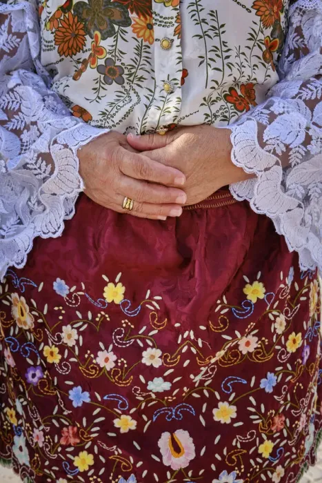 Framed Print : Detail of the traditional outfit used by Nazare women. Colourful dresses with seven skirts. Nazare, Portugal
