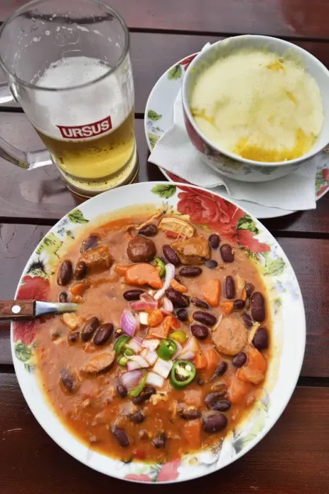 Framed Print : Traditional pork goulash prepared with hot sausages and red beans and traditional Framed Print : Traditional pork goulash prepared with hot sausages and red beans and traditional