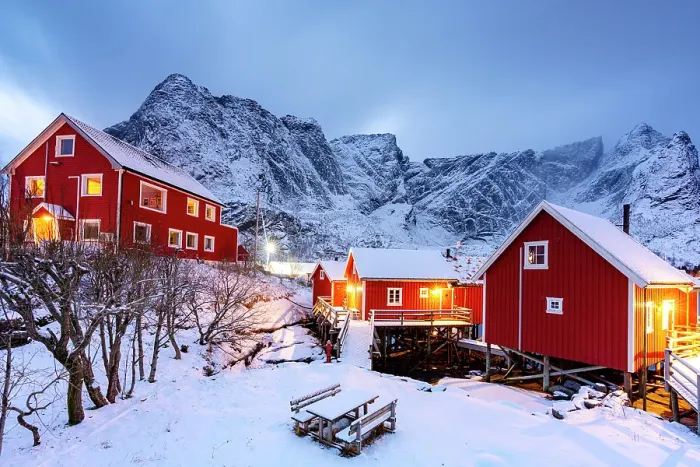 Framed Print : Traditional red cottages covered with snow at dusk, Reine, Lofoten Islands, Norway Framed Print : Traditional red cottages covered with snow at dusk, Reine, Lofoten Islands, Norway