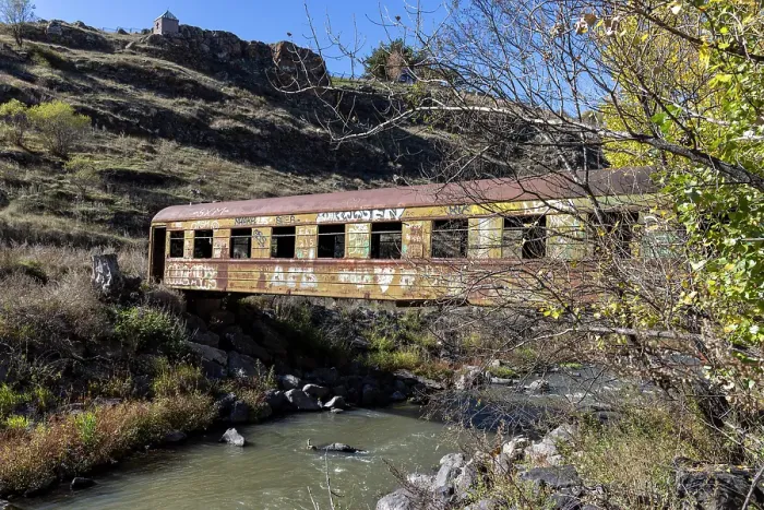 Framed Print : A train carriage used as a bridge to cross a river, between Akhaltsikhe and Akhalkalaki, Georgia Framed Print : A train carriage used as a bridge to cross a river, between Akhaltsikhe and Akhalkalaki, Georgia