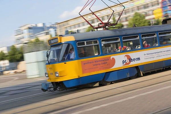 Tram passing through Augustusplatz, Leipzig, Saxony, Germany