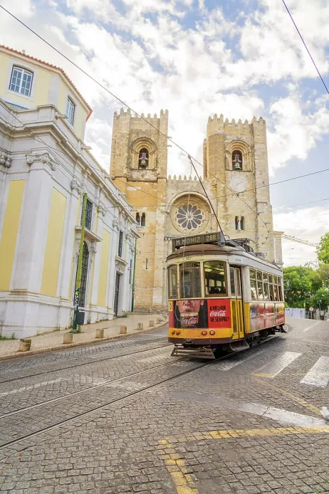 Framed Print : Tram passing Lisbon Cathedral, Lisbon, Portugal, Europe Framed Print : Tram passing Lisbon Cathedral, Lisbon, Portugal, Europe