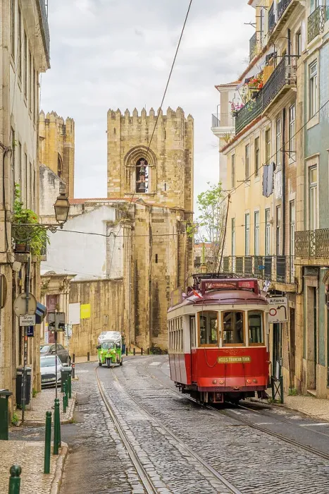 Framed Print : Tram passing Lisbon Cathedral, Lisbon, Portugal, Europe