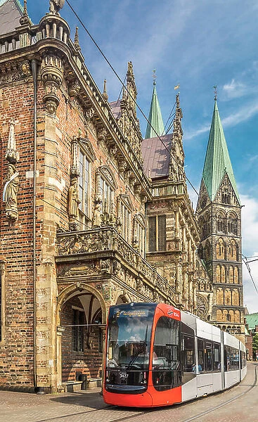 Tram in front of the town hall on the market square, in the background St. Petri Cathedral, Bremen, Germany