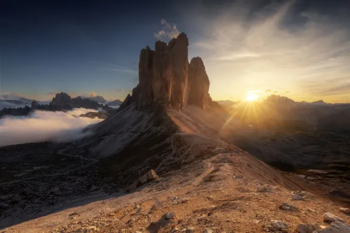 Framed Print : The Tre Cime di Lavaredo lined up from the Forcella Lavaredo during a cold late summer sunset, with the Cadini di Misurina emerging from the fog on the left. Dolomites, Italy Framed Print : The Tre Cime di Lavaredo lined up from the Forcella Lavaredo during a cold late summer sunset, with the Cadini di Misurina emerging from the fog on the left. Dolomites, Italy