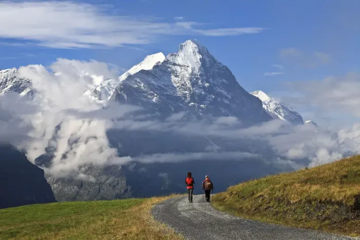 Framed Print : Trekkers infornt of the Eiger, Switzerland Framed Print : Trekkers infornt of the Eiger, Switzerland