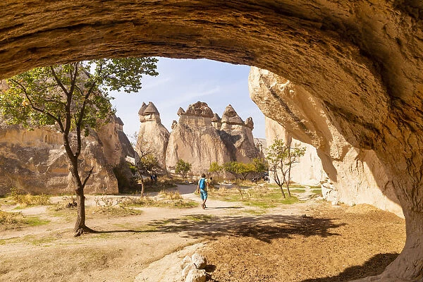 Trekking into Zelve valley between rock formations. Goreme, Kaisery district, Anatolia
