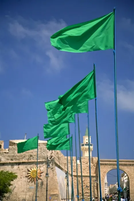 Framed Print : Tripoli, Libya; Libyan flags prominently displayed on Green Square in front of the entrance to the old Medina Framed Print : Tripoli, Libya; Libyan flags prominently displayed on Green Square in front of the entrance to the old Medina