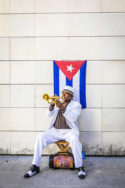A trumpet player in Plaza de Armas, La Habana Vieja (Old Town), Havana, Cuba