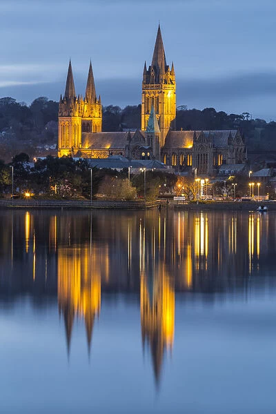 Truro Cathedral reflected in Truro River at dusk, Truro, Cornwall, England